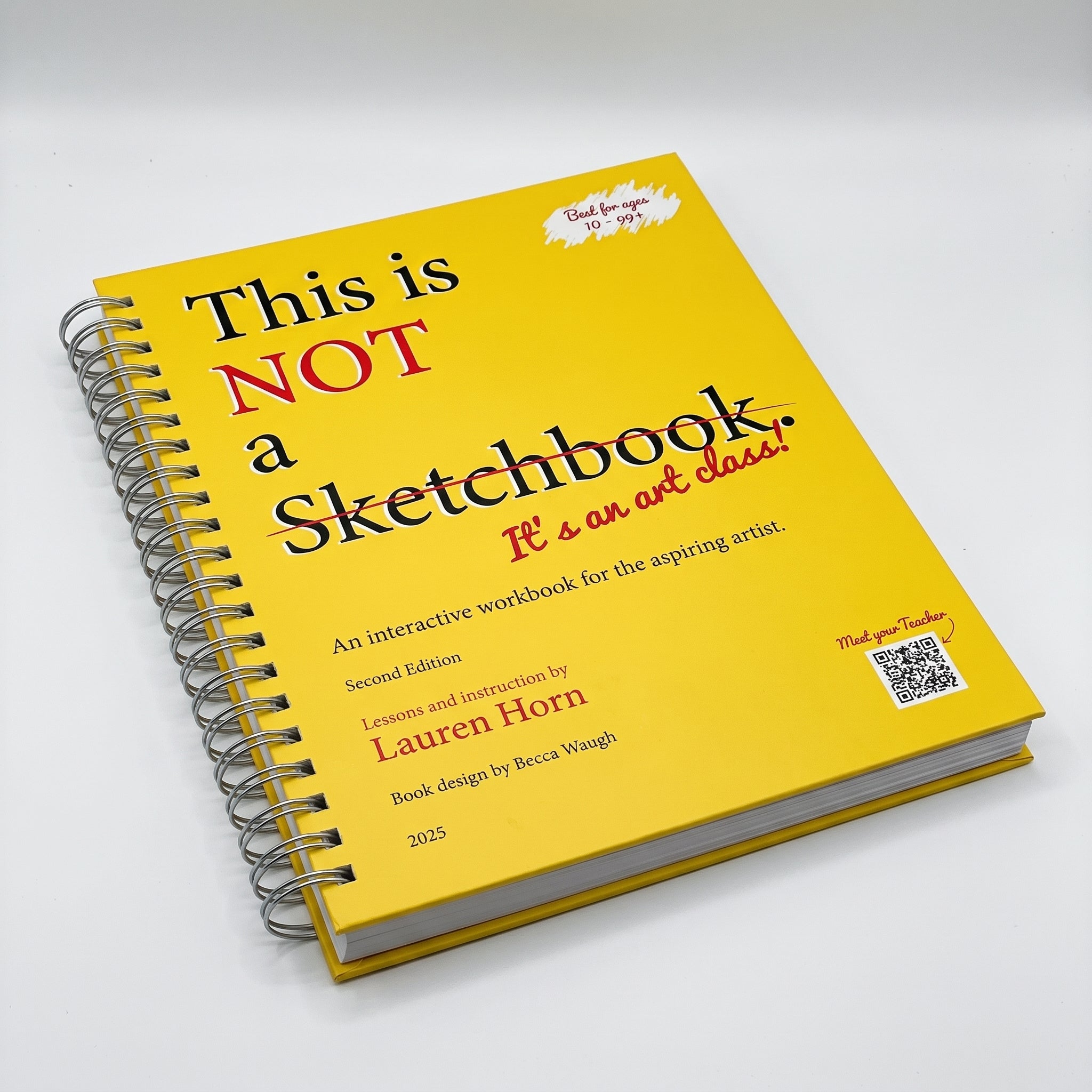 Closed spiral-bound art workbook shown at a slight angle on a clean white background.