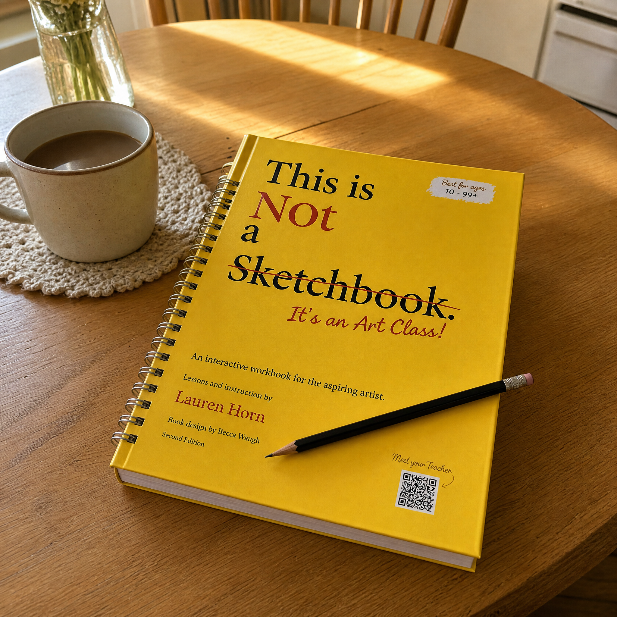 The book beside a coffee mug, no phone or app in view